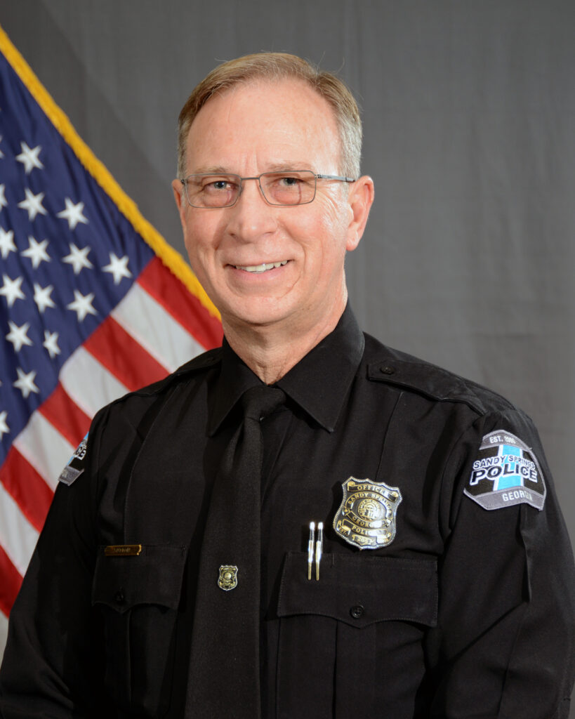 Official portrait of Officer Suttion
